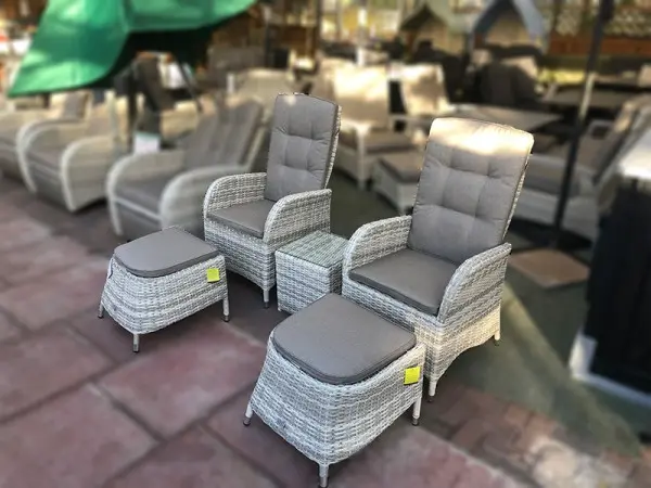 Footstools included-put your feet up, then tuck away