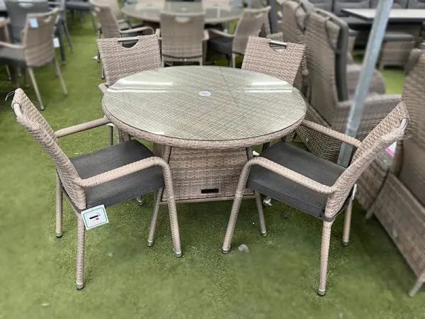 Four chairs stack into one column
