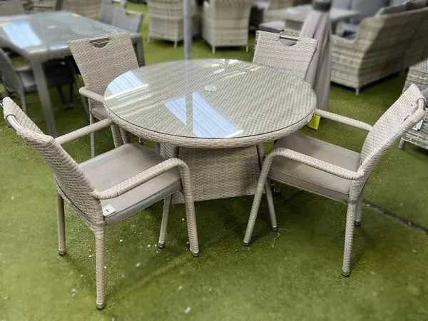 Four chairs stack into one column