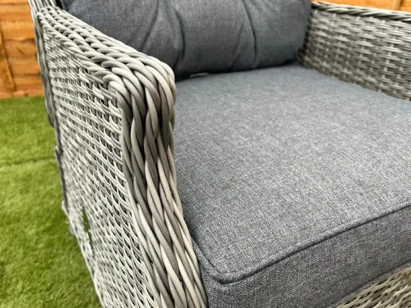 What arrives: chairs, glass-top table, cushions-delivery included