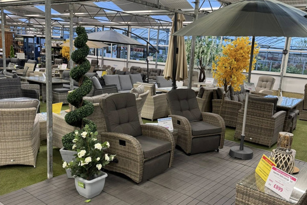 Rattan furniture sets out on the showroom floor at Sapcote